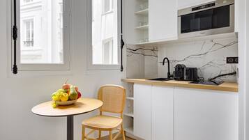 Fridge, microwave, coffee/tea maker, toaster