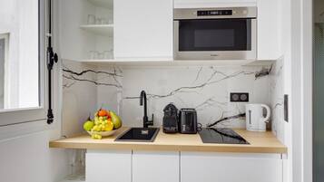 Fridge, microwave, coffee/tea maker, toaster