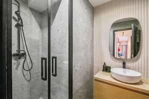 Shower, hair dryer, towels, soap