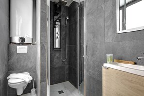 Shower, hair dryer, towels, soap