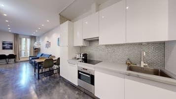 Microwave, oven, toaster, dining tables