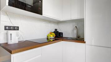 Fridge, microwave, coffee/tea maker, toaster