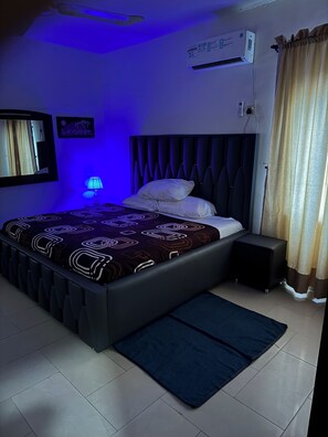 1 bedroom, desk, laptop workspace, bed sheets