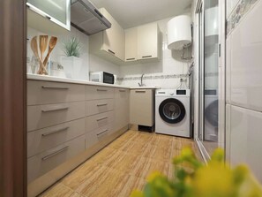 Fridge, microwave, coffee/tea maker, toaster