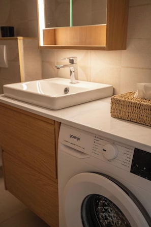 Shower, towels, soap, shampoo - Superior apartment at Gozsdu (Budapest)