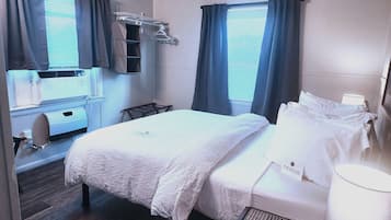 1 habitación, tabla de planchar con plancha, wifi gratis y ropa de cama