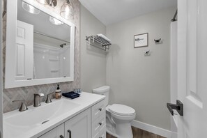 Hair dryer, towels, soap, shampoo