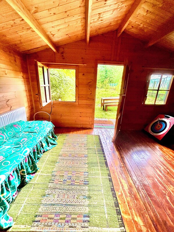 1 bedroom, desk, iron/ironing board, travel crib