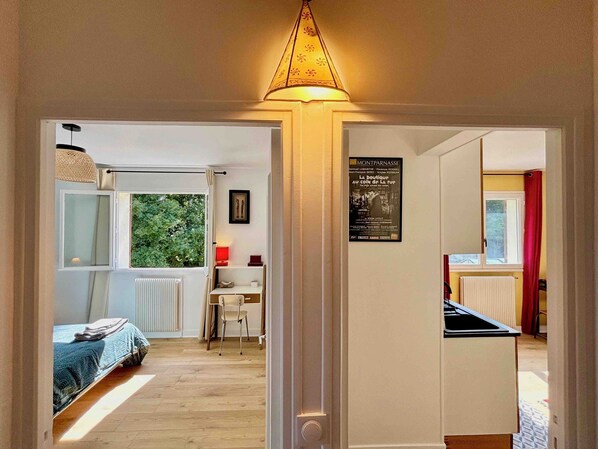 1 bedroom, desk, iron/ironing board, travel cot