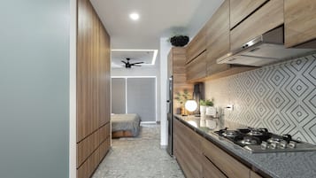 Fridge, microwave, stovetop, coffee/tea maker