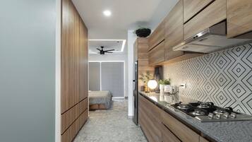 Fridge, microwave, stovetop, coffee/tea maker