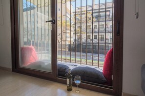 A room with a sliding glass door leading to a balcony. - Lovely apartment 50m from the beach! (Fuengirola)