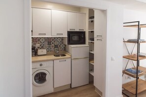 Fridge, microwave, toaster, cookware/dishes/utensils