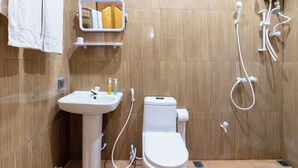 A modern bathroom with a sink, toilet, and shower. - Palm Oasis at Ukulhas (Ukulhas)