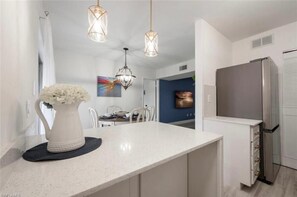 Enjoy cooking and dining in this well-equipped kitchen with a spacious dining area.