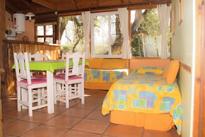 Cabane Confort, vue parc | Coin séjour