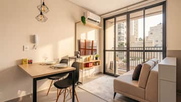 Basic Apartment | Living area | Flat-screen TV