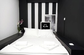 1 habitación, tabla de planchar con plancha, wifi y ropa de cama 