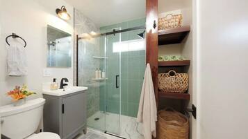 Hair dryer, towels, soap, toilet paper