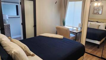 4 bedrooms, desk, iron/ironing board, travel crib