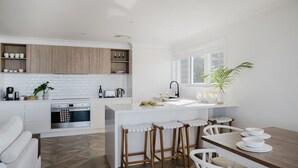 Private kitchen - Beach Bliss | Beachfront Luxury w/ Ocean Views (Mollymook Beach)