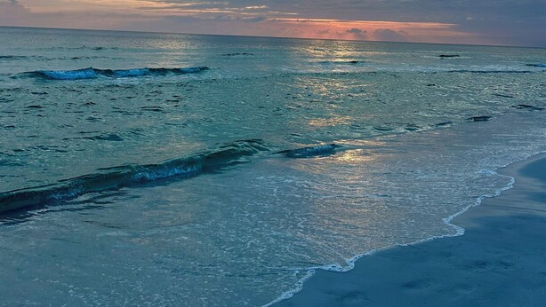 A beach with waves and a cloudy sky. - D's by the Sea - 3 BR condo steps from the beach (Miramar Beach)