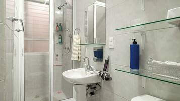 Hair dryer, towels, soap, toilet paper