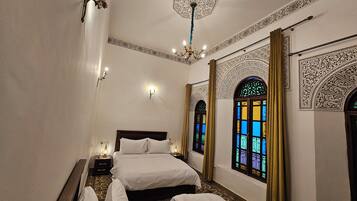 Habitación triple familiar | 2 dormitorios, wifi gratis, ropa de cama