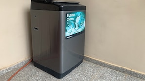 A trash bin with a digital display advertising 'Bubble Clean' soap. - 4mins to Aso-Rock Villa, King Bed, Chef, Free Cleaning, 24/7 Electricity  (Abuja)