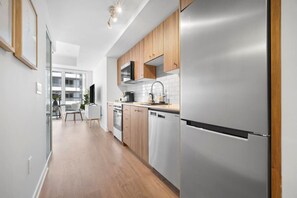 Fridge, microwave, oven, stovetop - Upscale Condo Steps from DTK (Kitchener)