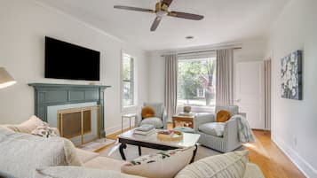 TV, fireplace, books