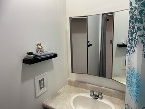 Hair dryer, towels, soap, shampoo