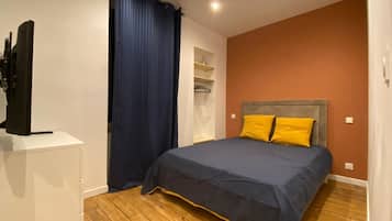 1 habitación, tabla de planchar con plancha y wifi