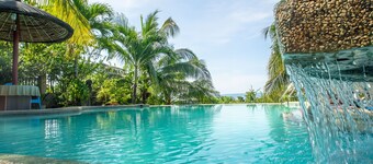 Spacious 5-bedroom Panglao Home with FREE transfers, Infinity Pool, WiFi, & A/C