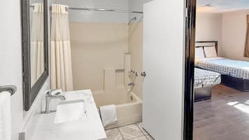 Standard Double Room, 2 Queen Beds | Bathroom | Bathtub, free toiletries, towels, soap