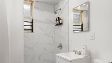 Shower, hair dryer, towels