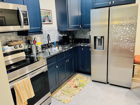 Fridge, microwave, oven, stovetop. Éowyn’s Outpost: For Adventurers and Nomads