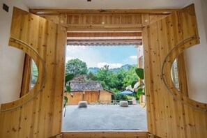 Unclassified image, 2 of 37, button - Zhaoxing Dong Village at that time, flowers blossoming, live music, courtyard homestay (Liping)