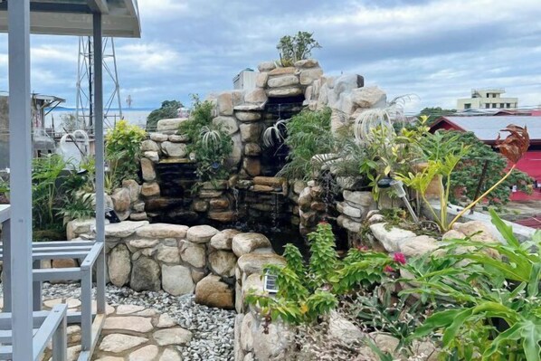 Garden - UrbanView @ Balzain East Tuguegarao City by RedDoorz (Tuguegarao)