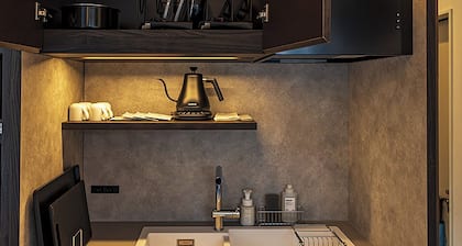 Family room modern kitchen with stove / Oshimagun Kagoshima