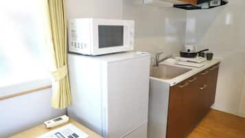 Fridge, microwave, stovetop, cookware/dishes/utensils