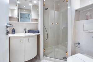 Shower, free toiletries, hair dryer, towels