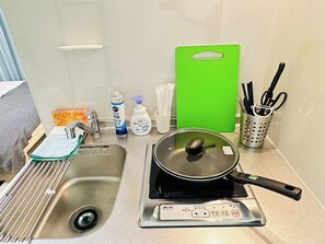 Fridge, microwave, cookware/dishes/utensils