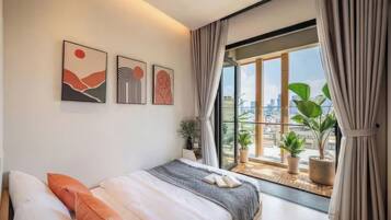 Superior Apartment, 2 Bedrooms, Kitchen, City View | Minibar, individually decorated, individually furnished, desk