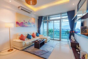 Superior Apartment, 3 Bedrooms, Kitchen, City View | Living area | 35-inch flat-screen TV with digital channels
