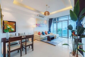 Superior Apartment, 3 Bedrooms, Kitchen, City View | Living area | 35-inch flat-screen TV with digital channels - Salute de Sailing Tower - Palace Garden (Ho Chi Minh City)