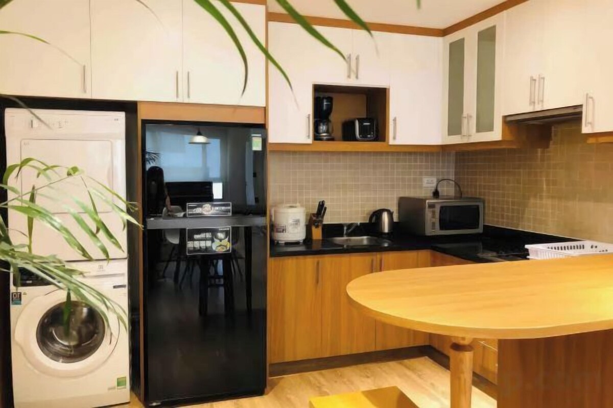 Cocina privada | Frigorífico, microondas, placa de cocina y arrocera