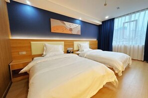 A hotel room with two beds, a wooden headboard, a nightstand, a wall-mounted artwork, and a large window with curtains. - Park Hyatt Fashion Hotel (Kaili cross street people's hospital） (Kaili)
