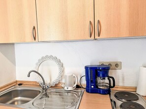 Fridge, toaster, cookware/dishes/utensils