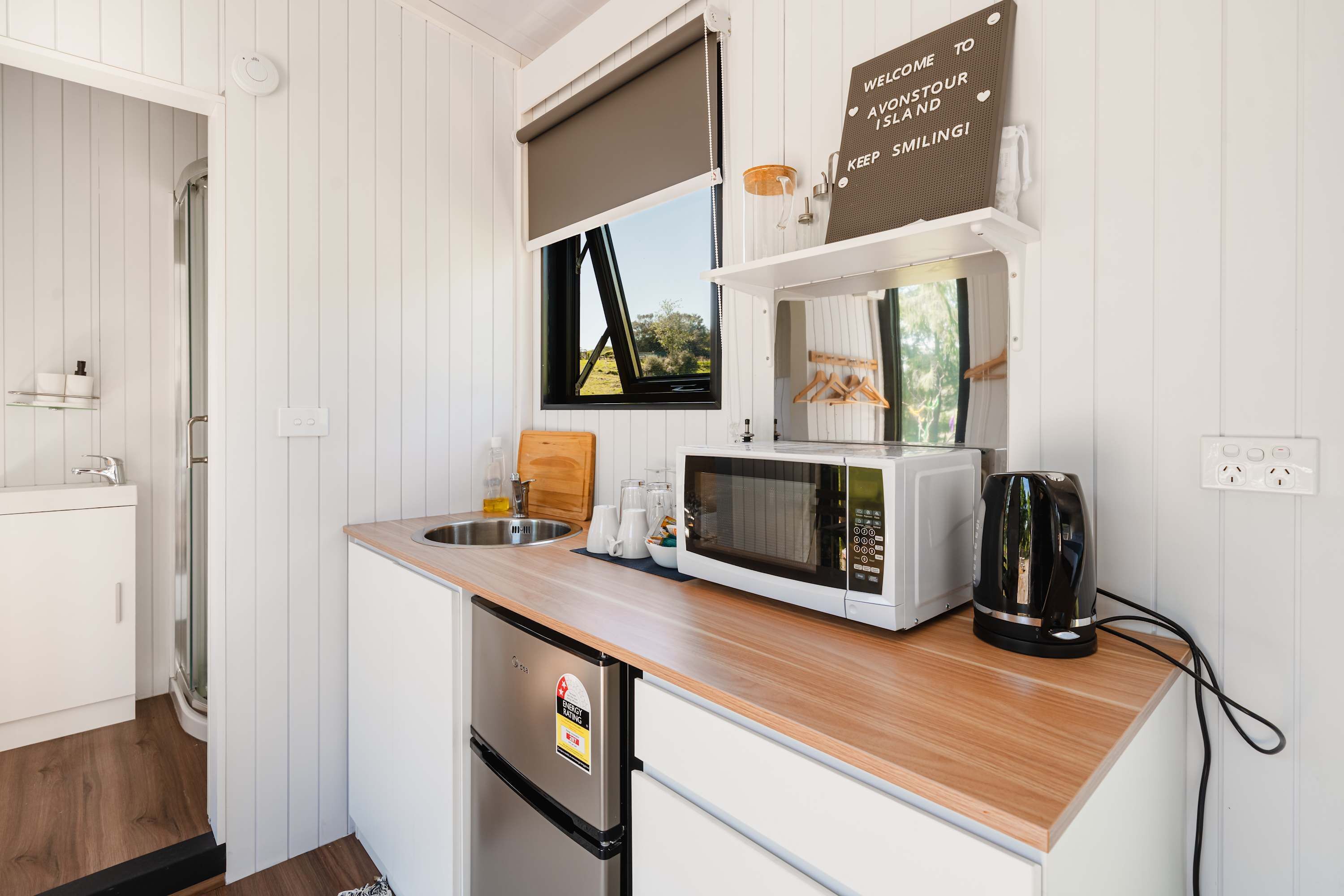 Fridge, microwave, stovetop, coffee/tea maker